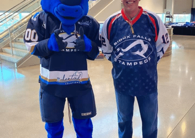 Dr. Dane with the Sioux Falls Stampede mascot